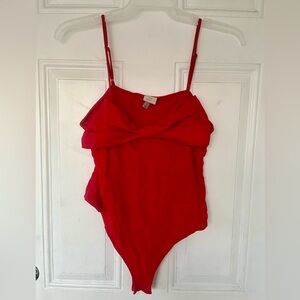 A new day Red Bow bodysuit size L. New without tags.